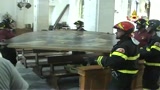Recupero di una tela nella Chiesa di Giampilieri