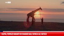 Clima, pupazzi giganti in viaggio dall’Africa all’Artico