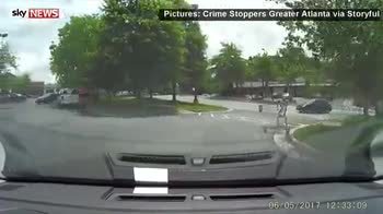 Man kicks in windscreen of moving car