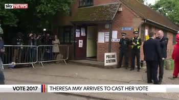 Theresa May arrives to cast her vote