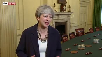 May forms 'stable and certain' Cabinet