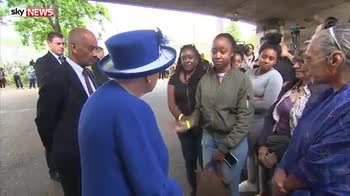 Queen meets fire victims, witnesses and volunteers