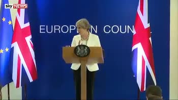 May denies blocking EU citizens' rights deal