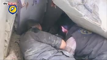 Child rescued from rubble after airstrike