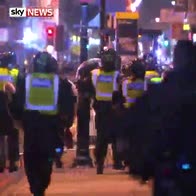 Calls for calm after riots over police death
