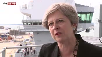 May criticises Trump's protest response