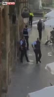 Armed police trawl Barcelona streets
