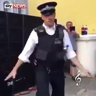Police officer at carnival with all the moves