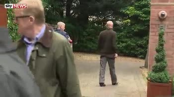 Rooney arrives home after arrest