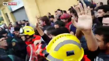 Catalan firefighters protect pro-vote protesters