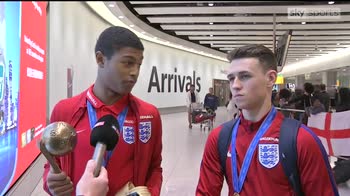 Brewster and Foden arrive in Heathrow after World Cup win