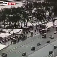Traffic camera films bus drive down underpass