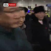 North Koreans arrive for Olympics