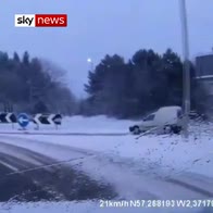 Van crashes into roundabout