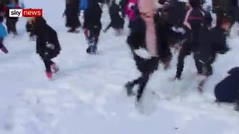 Pupils take on teachers in snowball fight