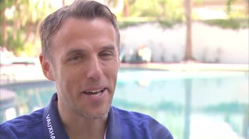 England mock Neville's 'dad clothes'