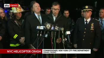 Helicopter crashes in New York City river