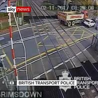 Truck destroys level crossing barrier