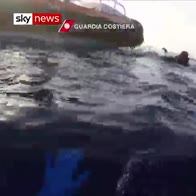 Migrants rescued as boat capsizes