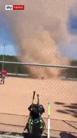 Dust devil whirls through softball game