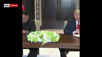 Trump-Kim sign 'comprehensive agreement'