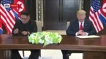 Trump-Kim sign 'comprehensive agreement'