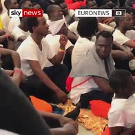 Migrants aboard ship heading for Spain