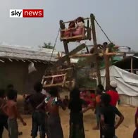 Rohingya kids play on makeshift Ferris wheel