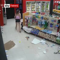 Female suspect crashes through ceiling