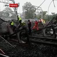 A Mumbai bridge collapses onto train tracks