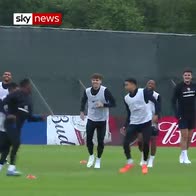 England squad warm up with rubber chickens