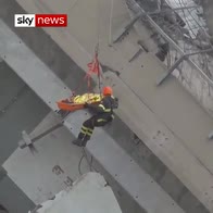 Moment person rescued from Genoa bridge