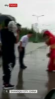 China floods won't stop brides