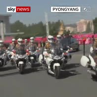 North and South: Korean leaders parade