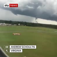 Plane lands safely near forming tornado