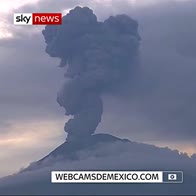Mexico volcano spews ash into air