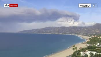 Time-lapse shows smoke over Malibu coast
