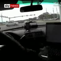 Robbery suspect slams into police car