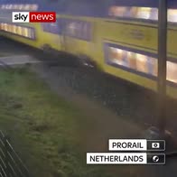 Watch: Train misses cyclist on level crossing