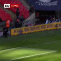 Ice fall at Wembley just misses goalkeeper