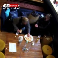 CCTV catches woman putting hair in food