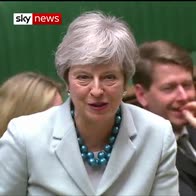 Opposition MP berates May's phone use