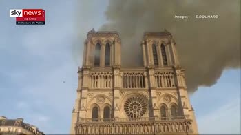 Firefighters film the Notre Dame blaze
