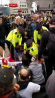Moment climate protester arrested