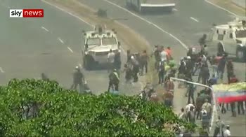 National Guard drives into protesters in Caracas