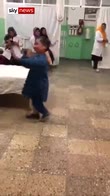 Boy with prosthetic leg dances with joy