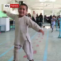 Afghan amputee boy, 6, dances with joy