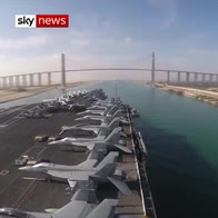 US aircraft carrier moves along Suez canal