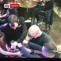 Barman spills two trays of beer in a row