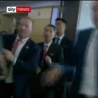 Trump press secretary in scuffle with Kim guards